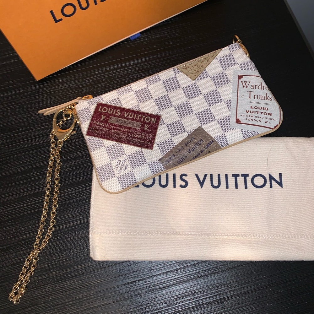 Louis Vuitton Mila Clutch